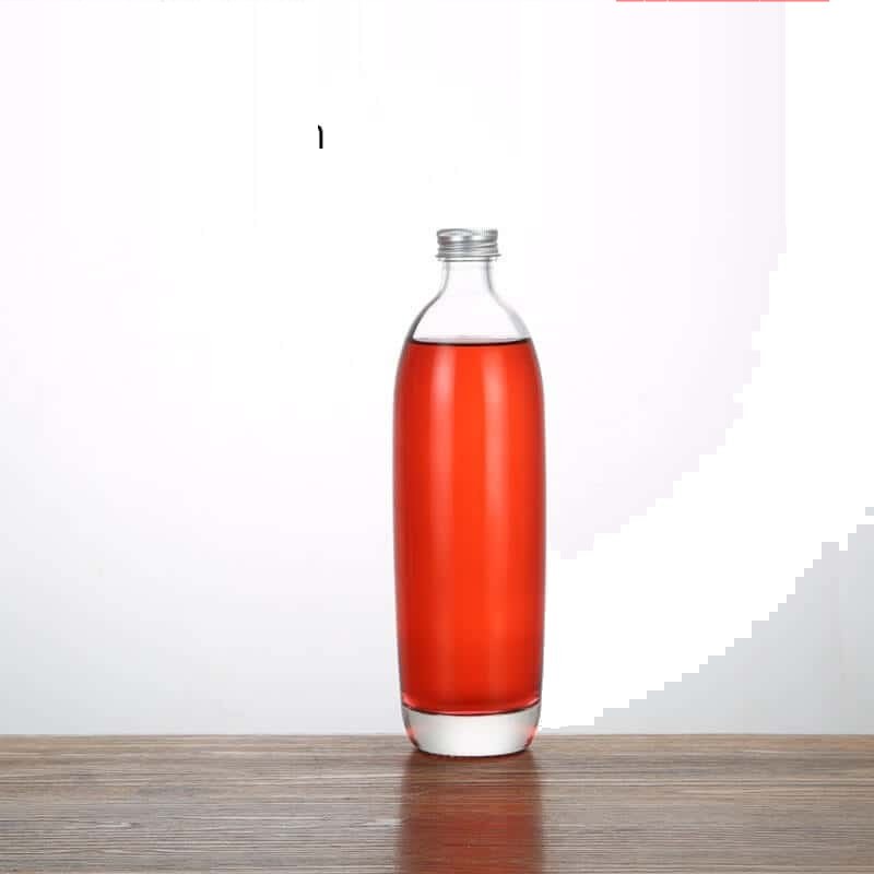 Round liquor bottle, 330 ml, filled with a rose-coloured spirit
